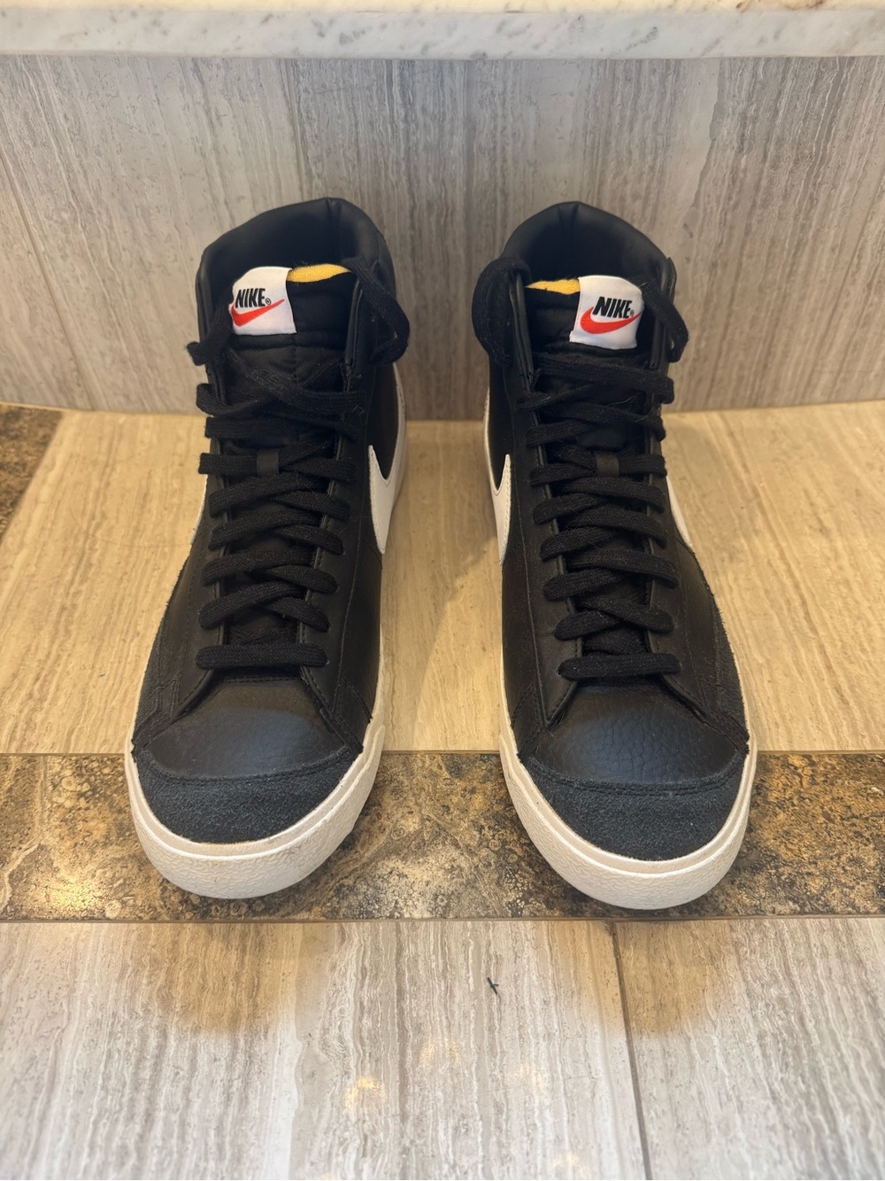 Nike Black & White High-Top Sneakers with Subtle Yellow Tongue Accent